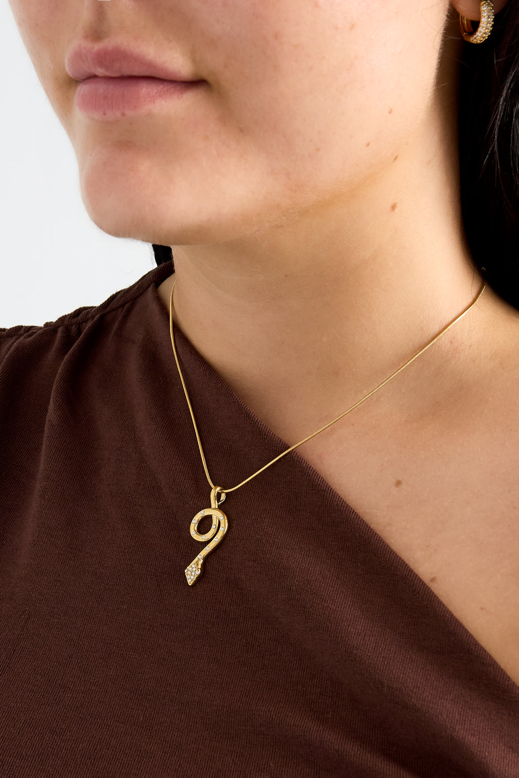 Necklace with covered snake charm